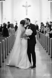 Bride and groom wedding kiss