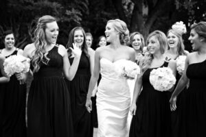 Bride and bridesmaids having fun
