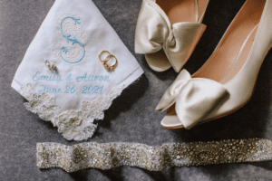 Wedding rings, shoes, and garter